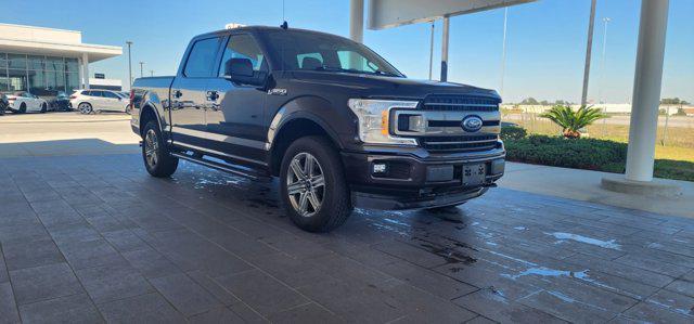 used 2018 Ford F-150 car, priced at $25,677