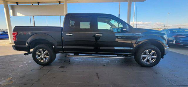used 2018 Ford F-150 car, priced at $25,677