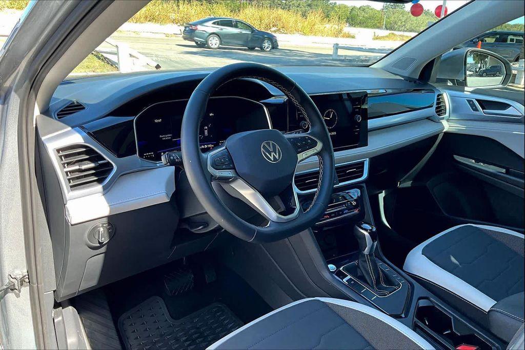 used 2025 Volkswagen Taos car, priced at $24,791