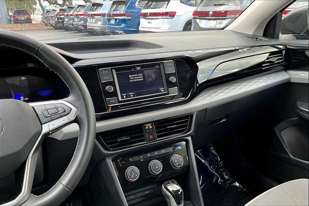 used 2024 Volkswagen Taos car, priced at $18,983