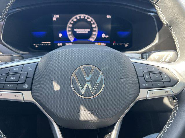 used 2022 Volkswagen Taos car, priced at $22,500