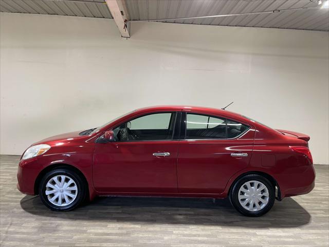 used 2014 Nissan Versa car, priced at $3,982