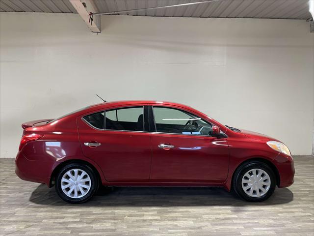 used 2014 Nissan Versa car, priced at $3,982