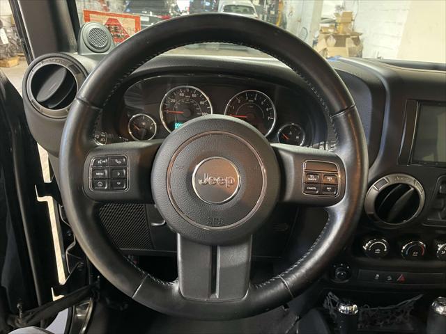 used 2012 Jeep Wrangler Unlimited car, priced at $13,482