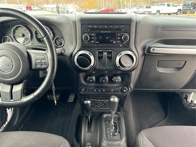 used 2014 Jeep Wrangler car, priced at $14,326