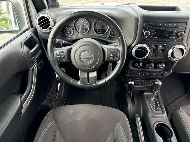 used 2014 Jeep Wrangler car, priced at $14,326