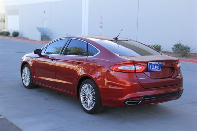 used 2016 Ford Fusion car, priced at $10,900