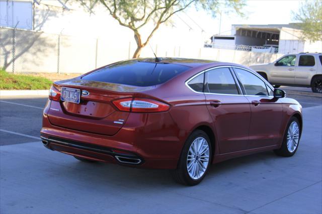 used 2016 Ford Fusion car, priced at $10,900