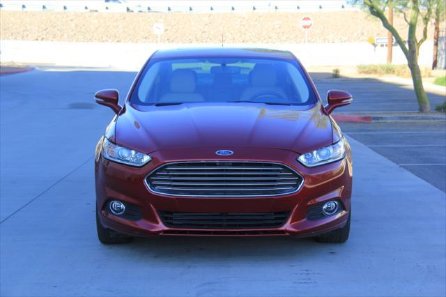 used 2016 Ford Fusion car, priced at $10,900