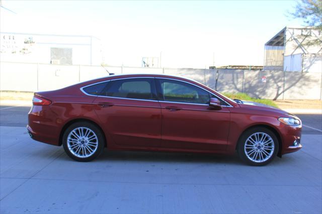 used 2016 Ford Fusion car, priced at $10,900