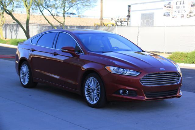 used 2016 Ford Fusion car, priced at $10,900