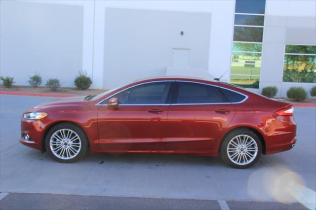 used 2016 Ford Fusion car, priced at $10,900