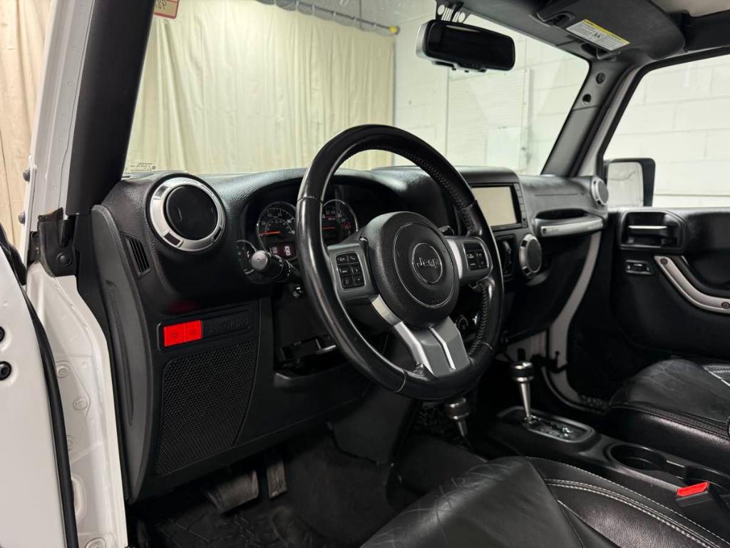 used 2015 Jeep Wrangler Unlimited car, priced at $18,985
