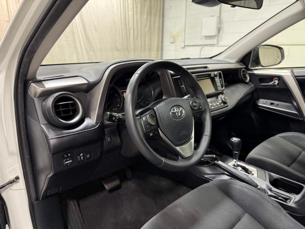 used 2018 Toyota RAV4 car, priced at $25,985