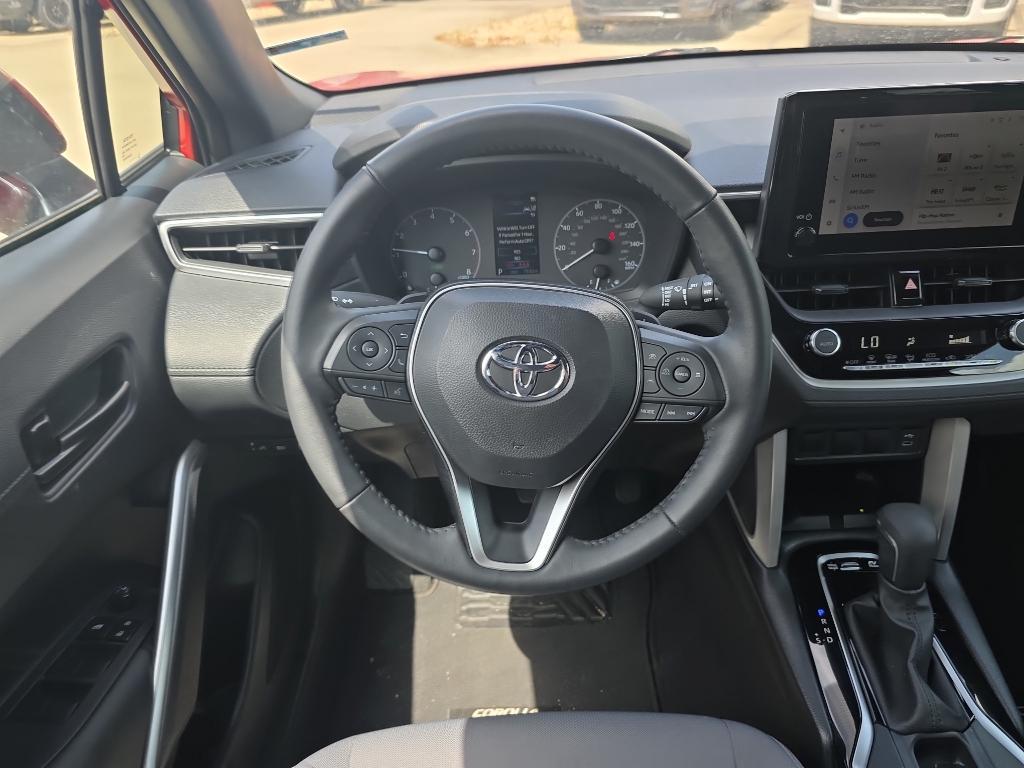 used 2024 Toyota Corolla Cross Hybrid car, priced at $29,477