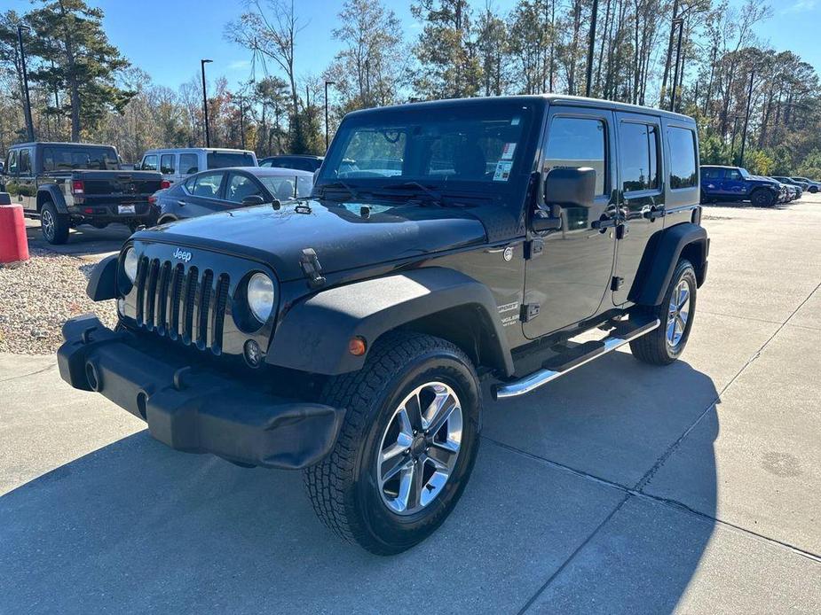 used 2014 Jeep Wrangler Unlimited car, priced at $14,277