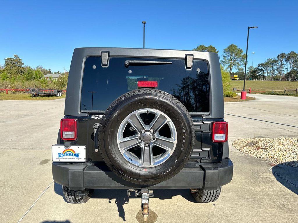 used 2014 Jeep Wrangler Unlimited car, priced at $14,277