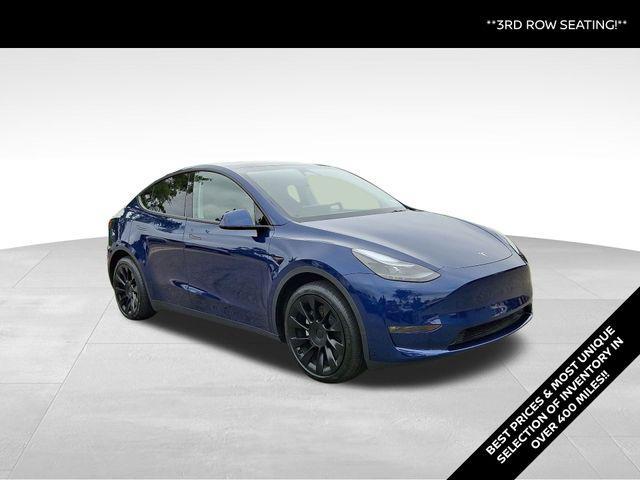 used 2024 Tesla Model Y car, priced at $34,469