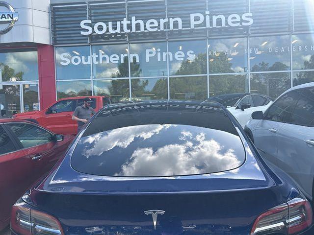 used 2024 Tesla Model Y car, priced at $34,997