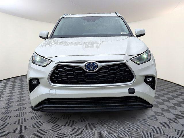 used 2021 Toyota Highlander Hybrid car, priced at $29,700