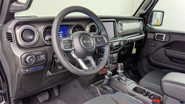 used 2022 Jeep Wrangler Unlimited 4xe car, priced at $38,769