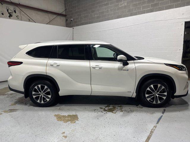 used 2020 Toyota Highlander Hybrid car, priced at $28,347