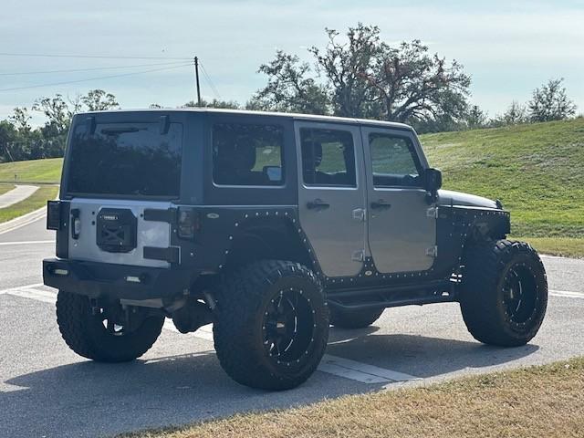 used 2015 Jeep Wrangler Unlimited car, priced at $23,995