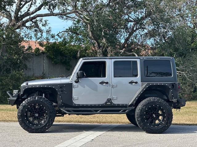 used 2015 Jeep Wrangler Unlimited car, priced at $23,995