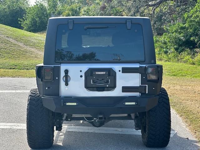 used 2015 Jeep Wrangler Unlimited car, priced at $23,995