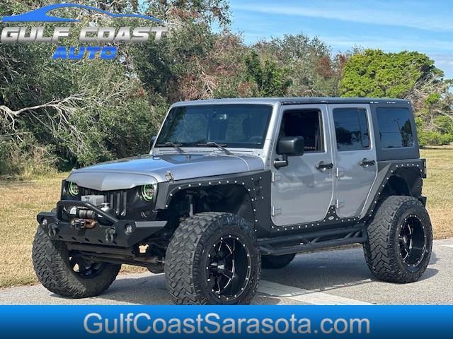 used 2015 Jeep Wrangler Unlimited car, priced at $23,995