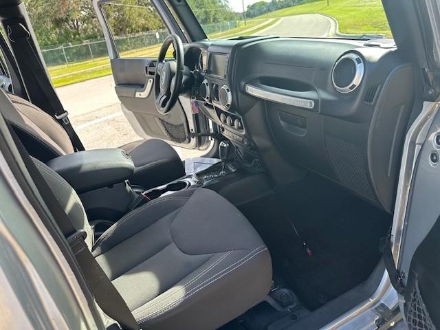 used 2015 Jeep Wrangler Unlimited car, priced at $23,995