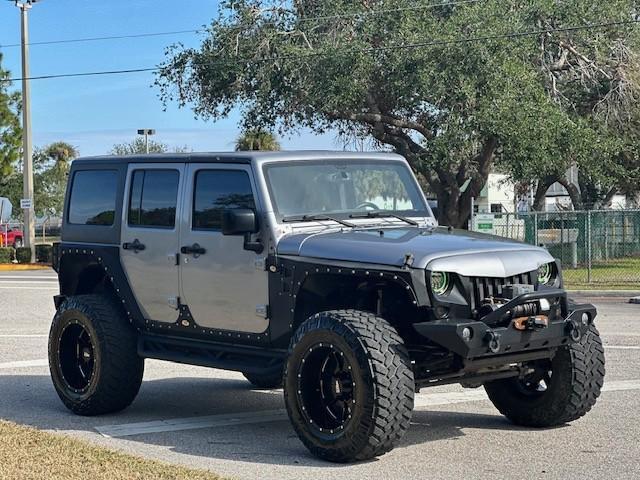 used 2015 Jeep Wrangler Unlimited car, priced at $23,995