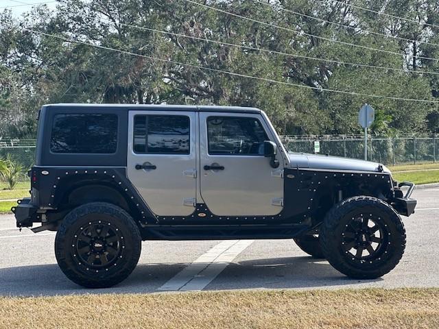 used 2015 Jeep Wrangler Unlimited car, priced at $23,995