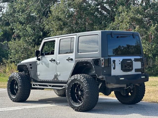 used 2015 Jeep Wrangler Unlimited car, priced at $23,995