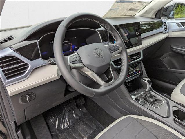 new 2025 Volkswagen Taos car, priced at $27,186
