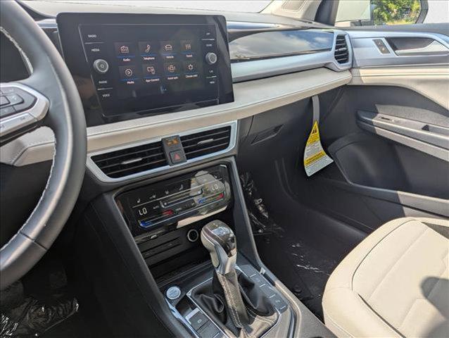 new 2025 Volkswagen Taos car, priced at $27,291