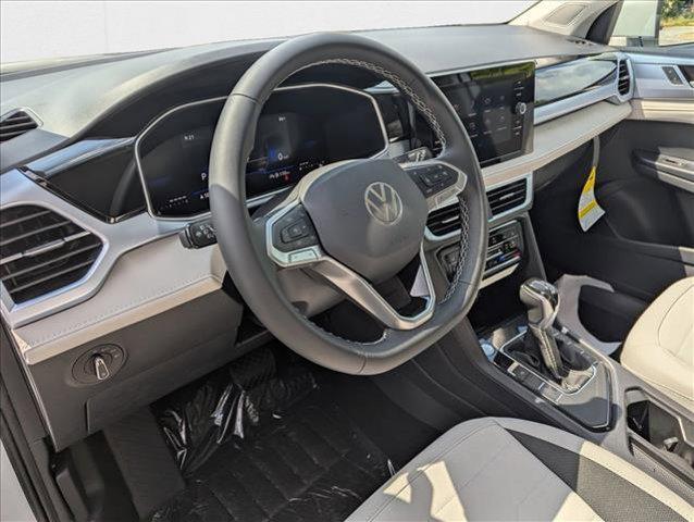 new 2025 Volkswagen Taos car, priced at $27,291