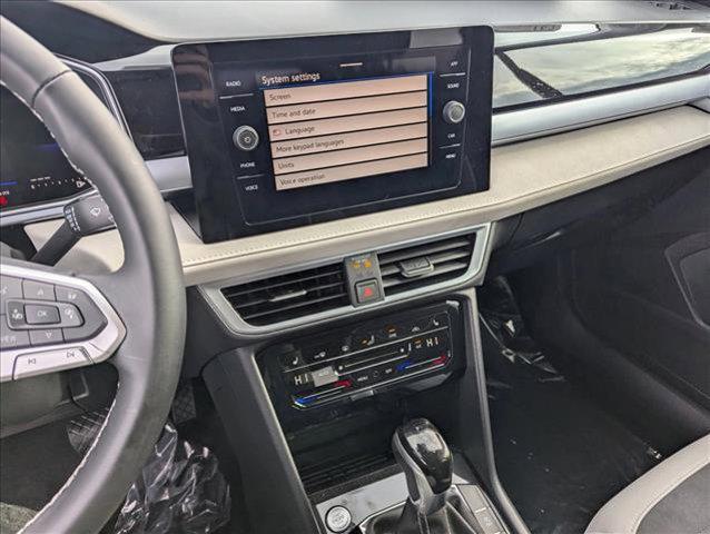 used 2025 Volkswagen Taos car, priced at $27,669