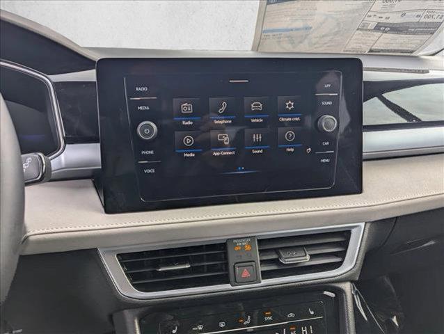 used 2025 Volkswagen Taos car, priced at $27,669