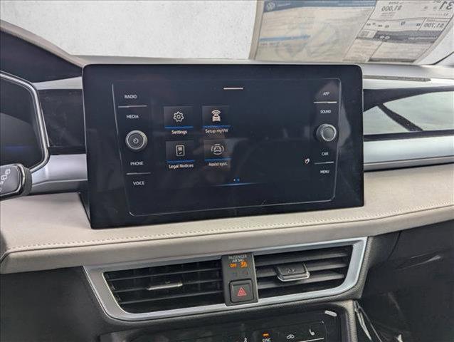 used 2025 Volkswagen Taos car, priced at $27,669