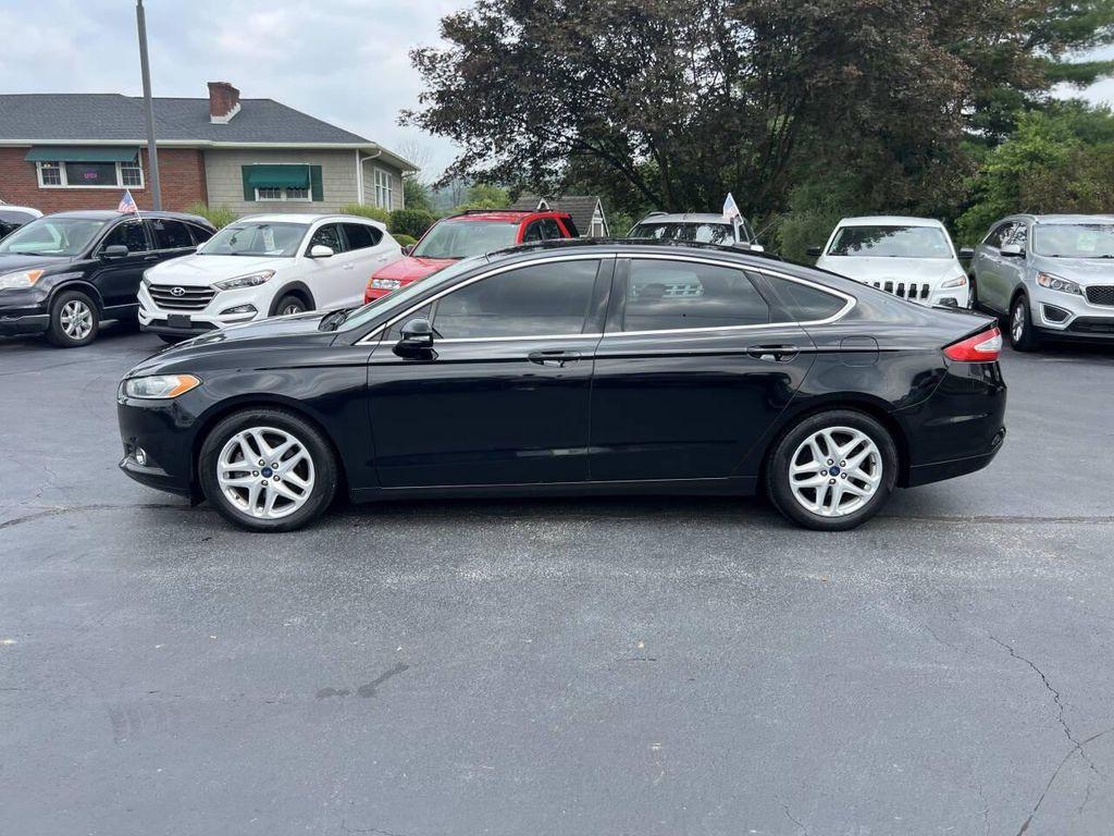 used 2016 Ford Fusion car, priced at $7,999