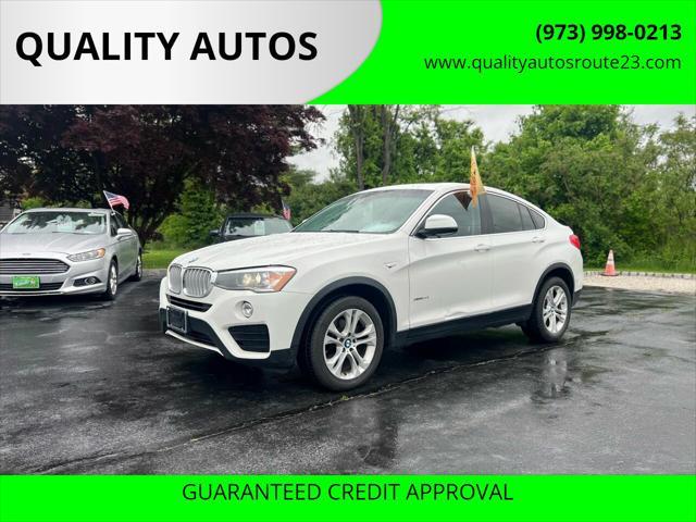 used 2015 BMW X4 car, priced at $9,999