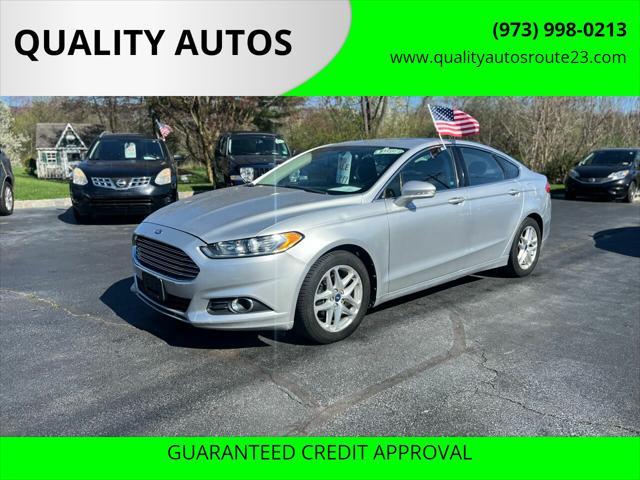 used 2013 Ford Fusion car, priced at $7,999