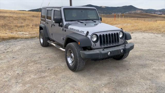 used 2014 Jeep Wrangler Unlimited car, priced at $18,130