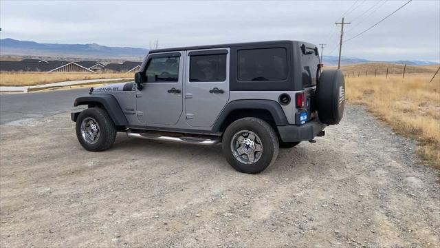 used 2014 Jeep Wrangler Unlimited car, priced at $17,907