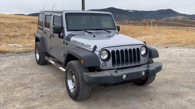 used 2014 Jeep Wrangler Unlimited car, priced at $16,653