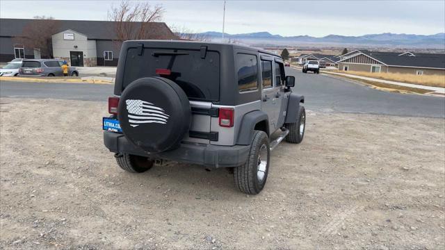 used 2014 Jeep Wrangler Unlimited car, priced at $18,130