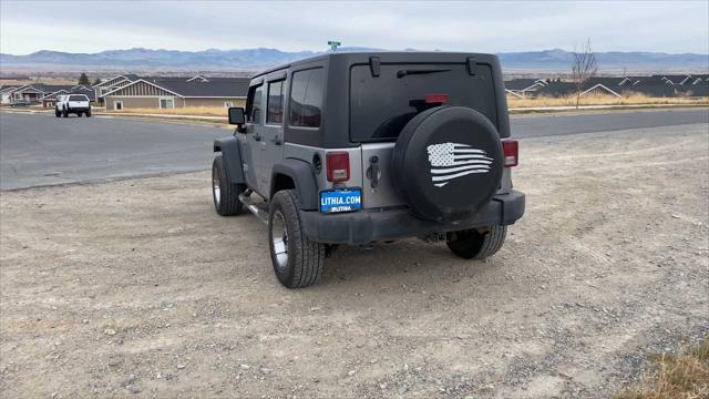 used 2014 Jeep Wrangler Unlimited car, priced at $18,130