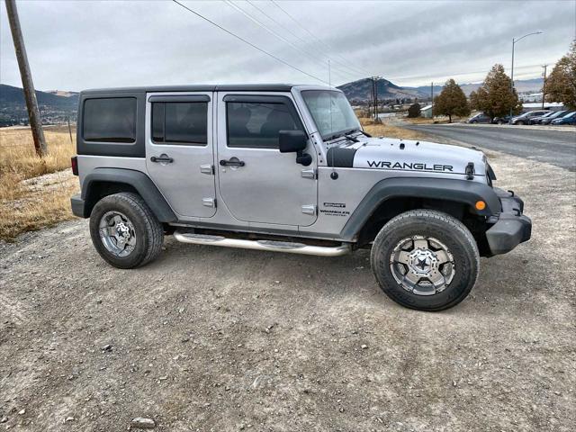 used 2014 Jeep Wrangler Unlimited car, priced at $18,130