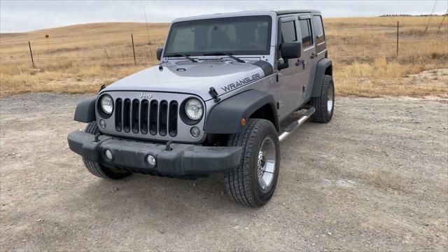 used 2014 Jeep Wrangler Unlimited car, priced at $18,130